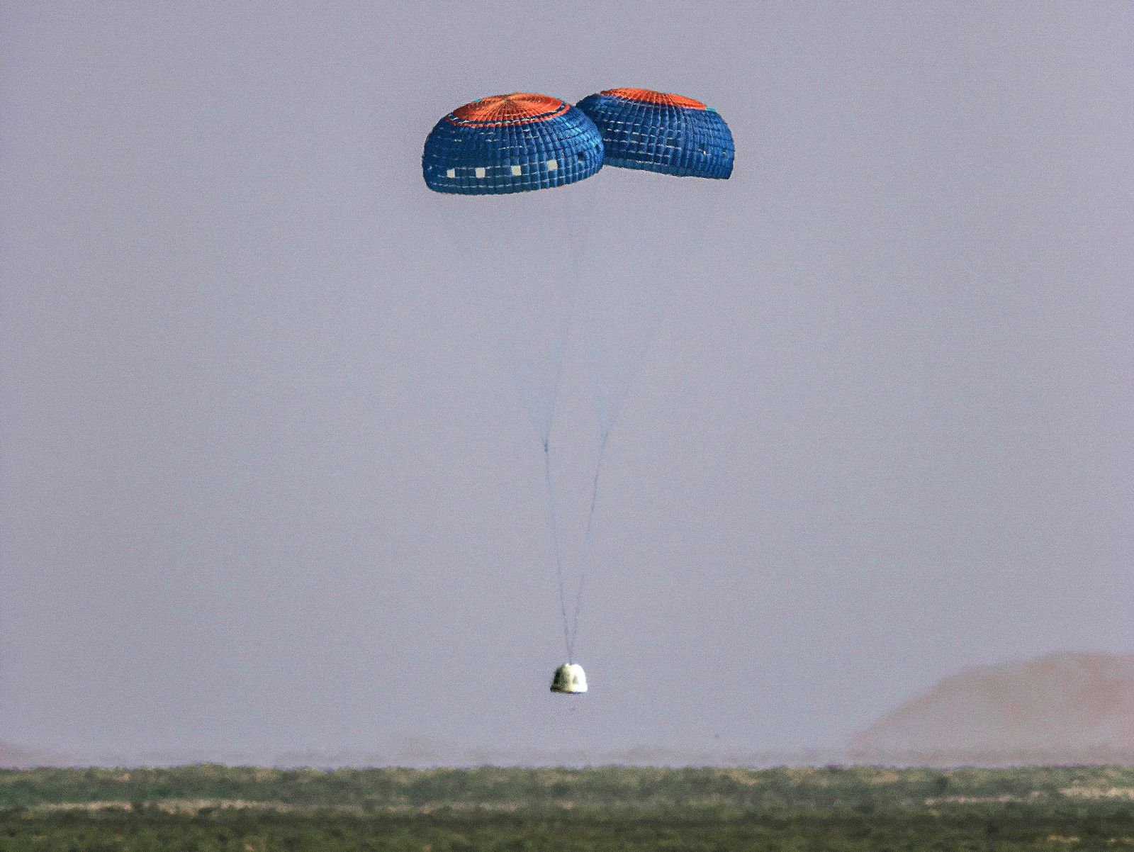 New Shepard Crew Capsule Jules Verne under parachutes