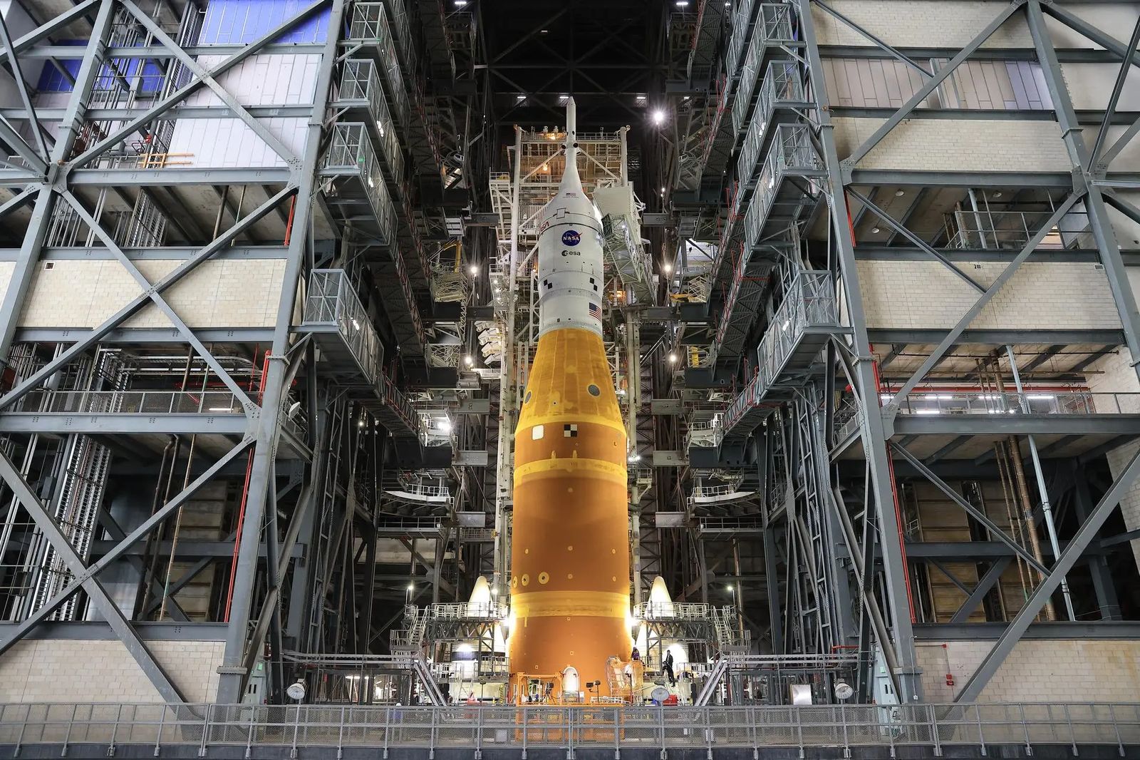 NASA’s Artemis II SLS (Space Launch System) rocket and Orion spacecraft, secured to the mobile launcher, stands vertical inside the Vehicle Assembly building on Tuesday, March 17, 2026, as preparations continue for rollout to Launch Complex 39B at NASA’s Kennedy Space Center in Florida. The Artemis II test flight will take Commander Reid Wiseman, Pilot Victor Glover, and Mission Specialist Christina Koch from NASA, and Mission Specialist Jeremy Hansen from the CSA (Canadian Space Agency), around
