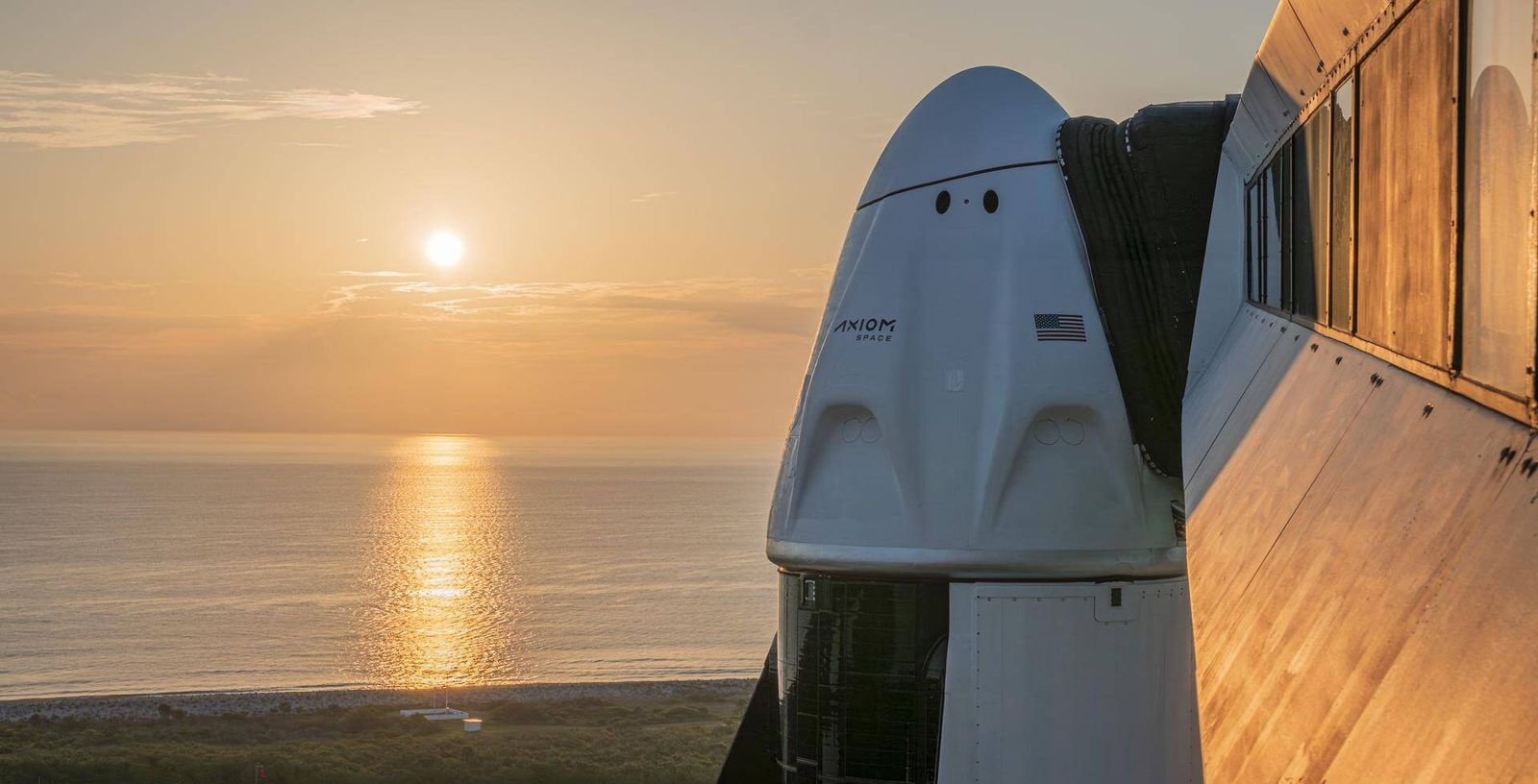 Crew Dragon at sunrise with Axiom logo