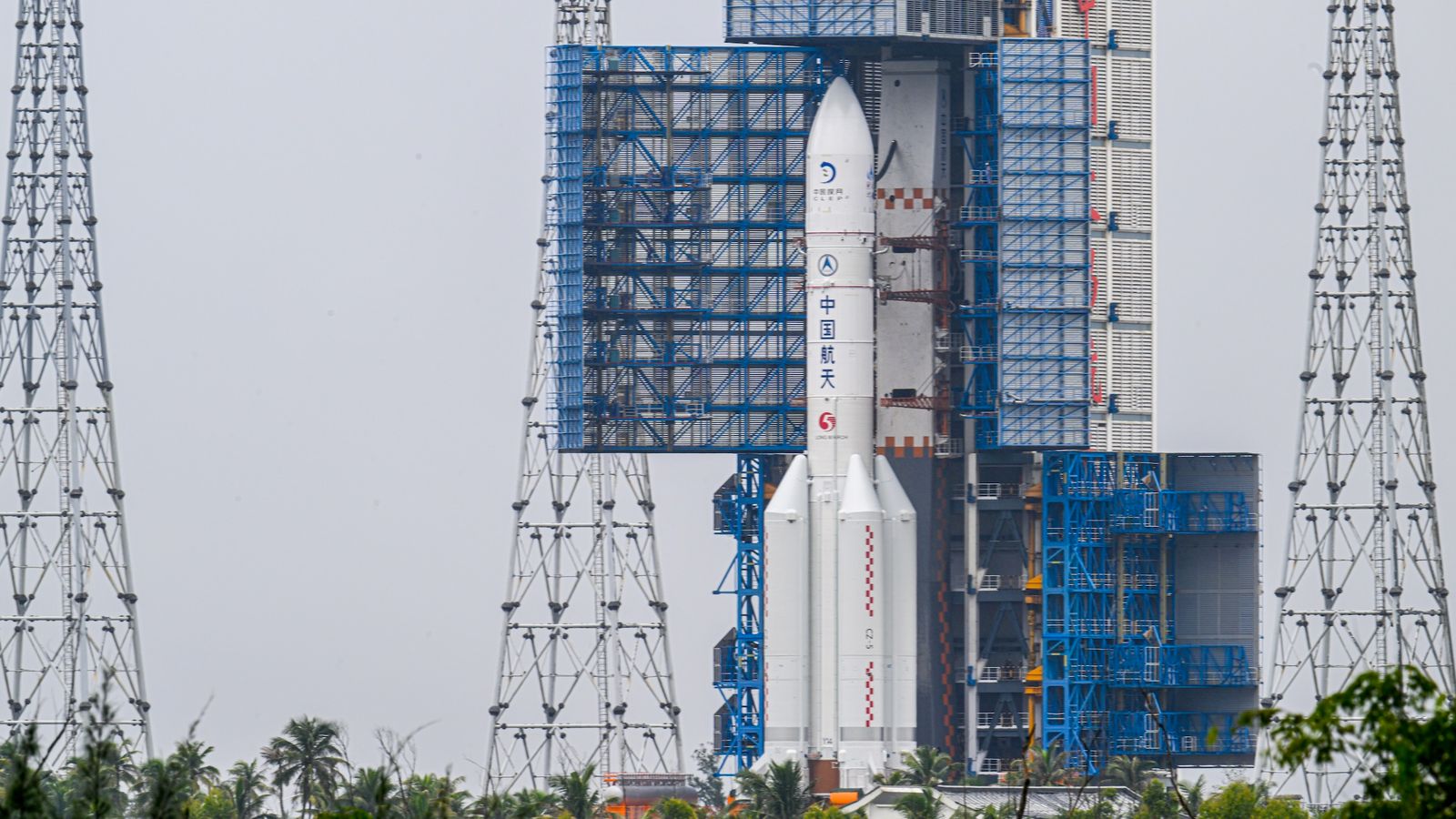China's Chang'e 7 lunar probe and its Long March 5 rocket are transferred to their pad at the Wenchang Spacecraft Launch Site on Aug. 19, 2026 in Wenchang, Hainan Province.