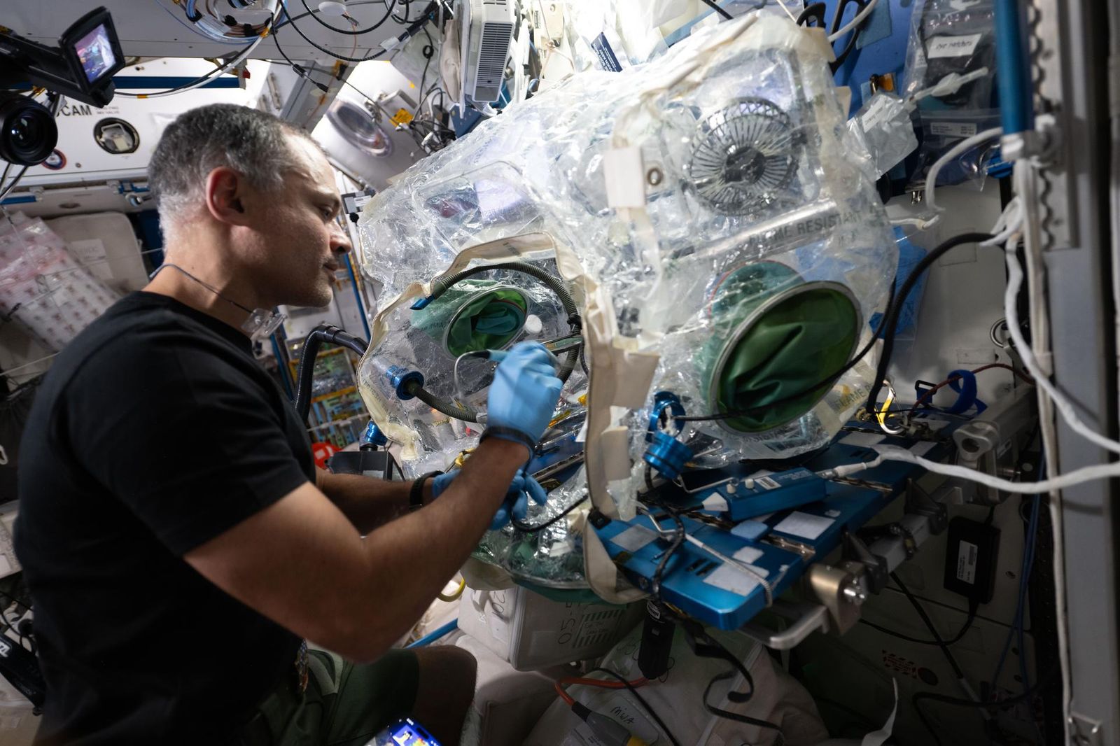 NASA astronaut and Expedition 75 flight engineer Anil Menon uses a lead-free soldering technique to solder components on a circuit board and demonstrate the manufacturing and repair of electronics in microgravity. Menon conducted safe research operations inside a container system attached to the Harmony module's maintenance work area to protect the International Space Station's atmosphere. The MIYOKA experiment will return the space-soldered samples to Earth for analysis and compared them to ide