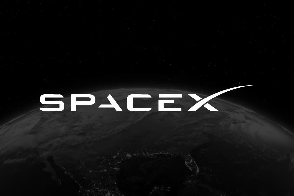SpaceX logo in white over a dark, partially lit Earth seen from space