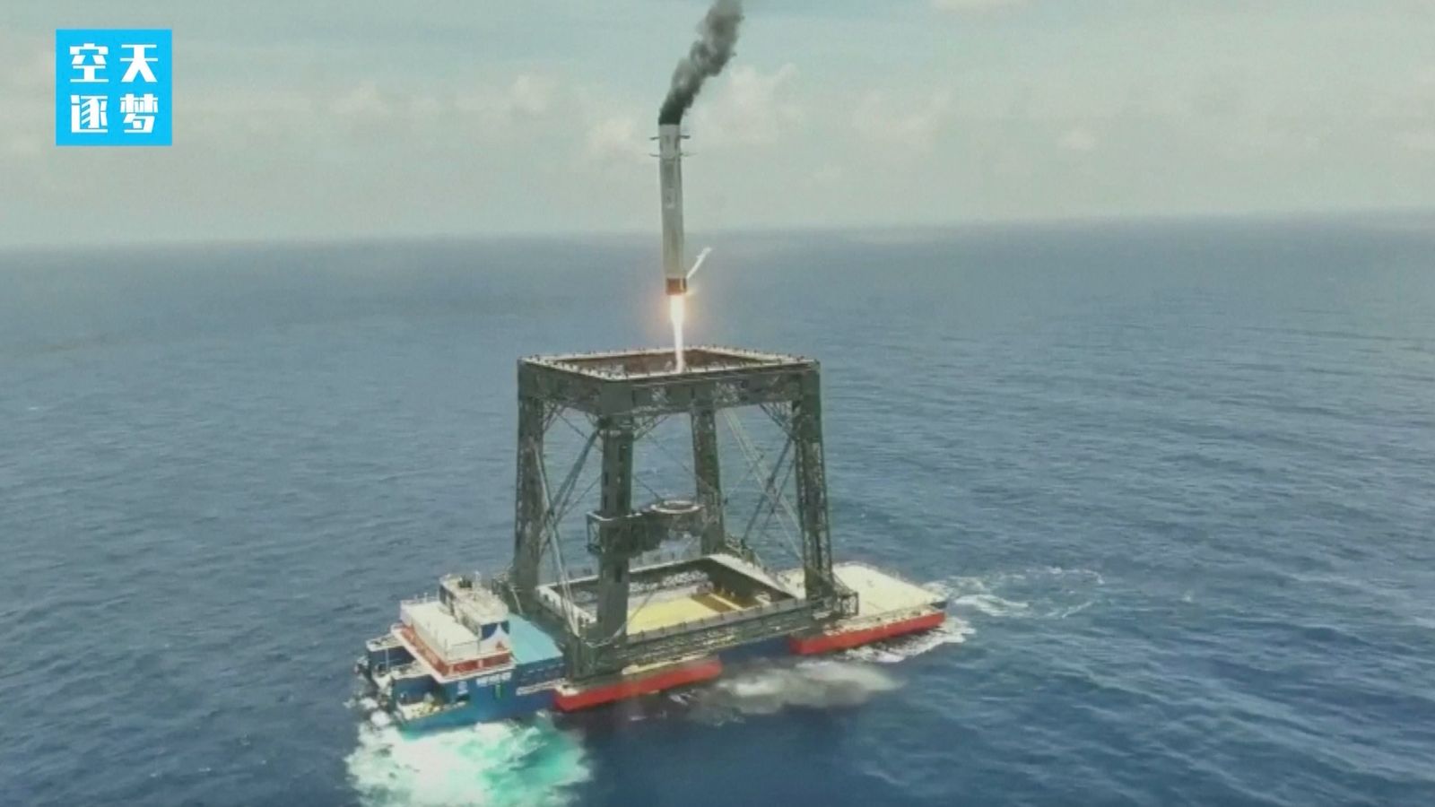 The first stage of a Chinese Long March 10B rocket comes down for a landing at sea after successfully sending a satellite to orbit on July 10, 2026.
