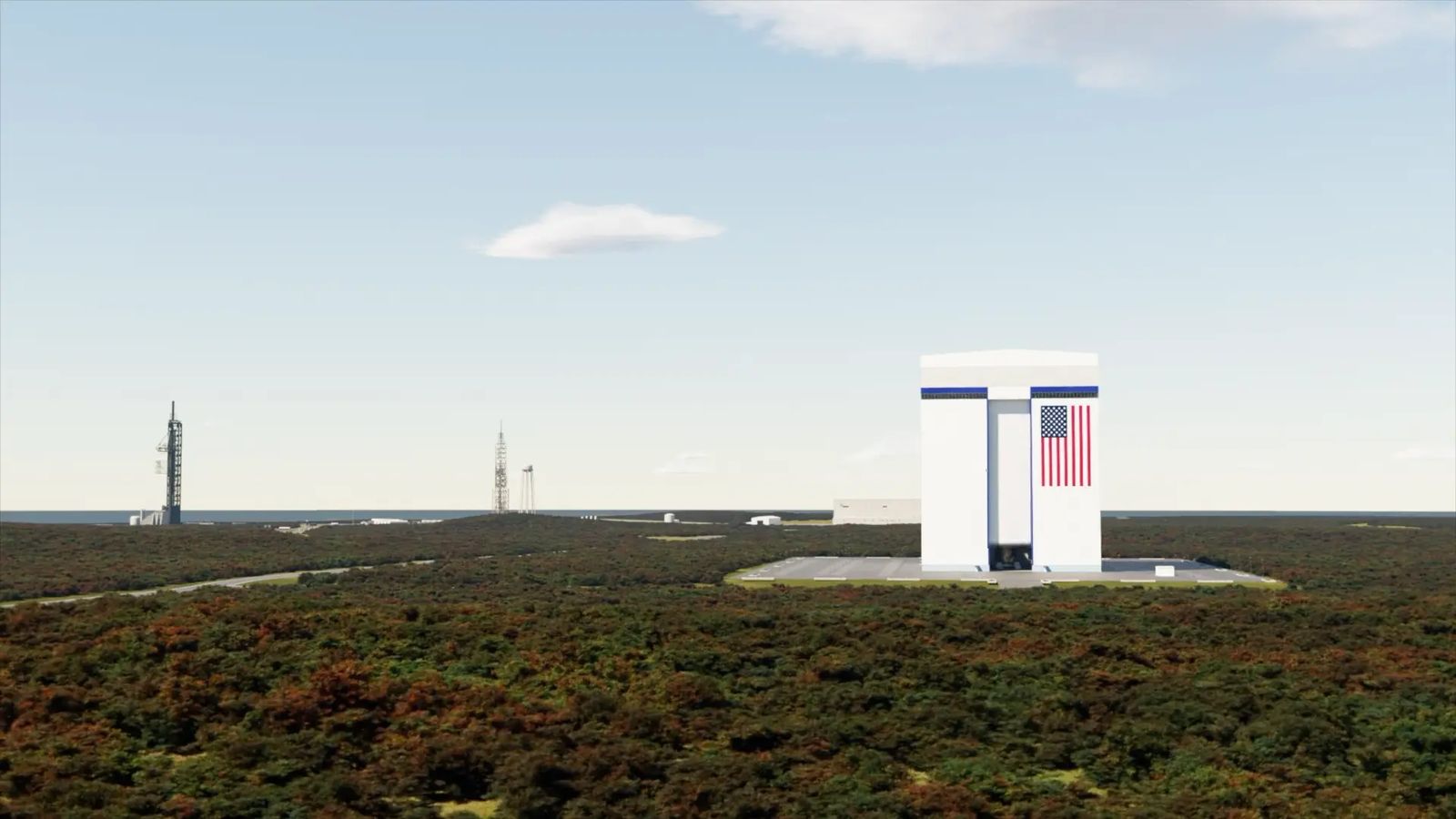 A square building stands on a flat landscape with a pair of rocket launch towers in the background.