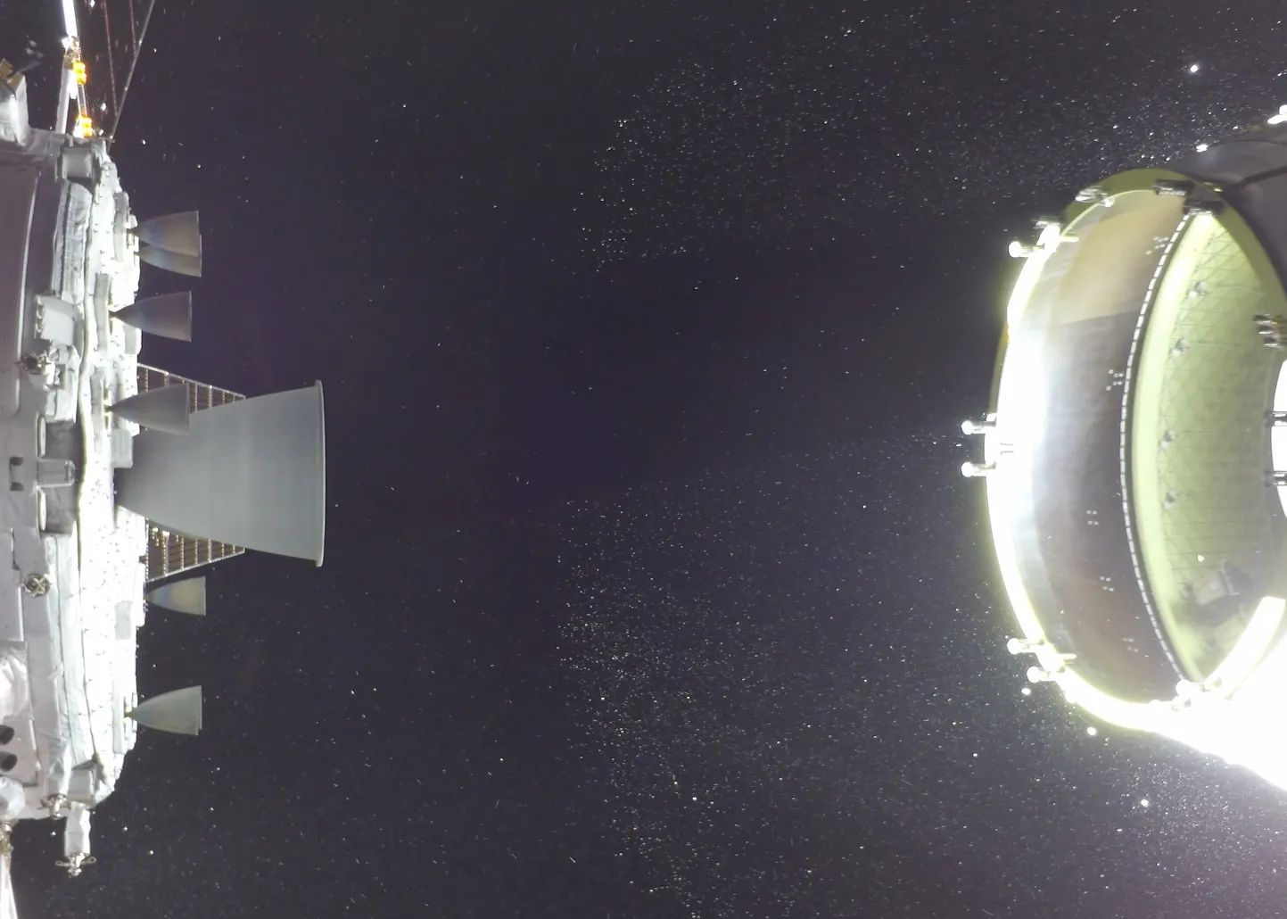 Two of the Artemis II CubeSats can be seen in the lower portion of the Orion stage adapter on the right side of the image.
