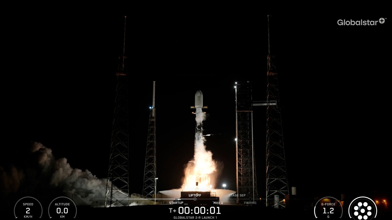 a black-and-white spacex falcon 9 rocket launches into a dark night sky.