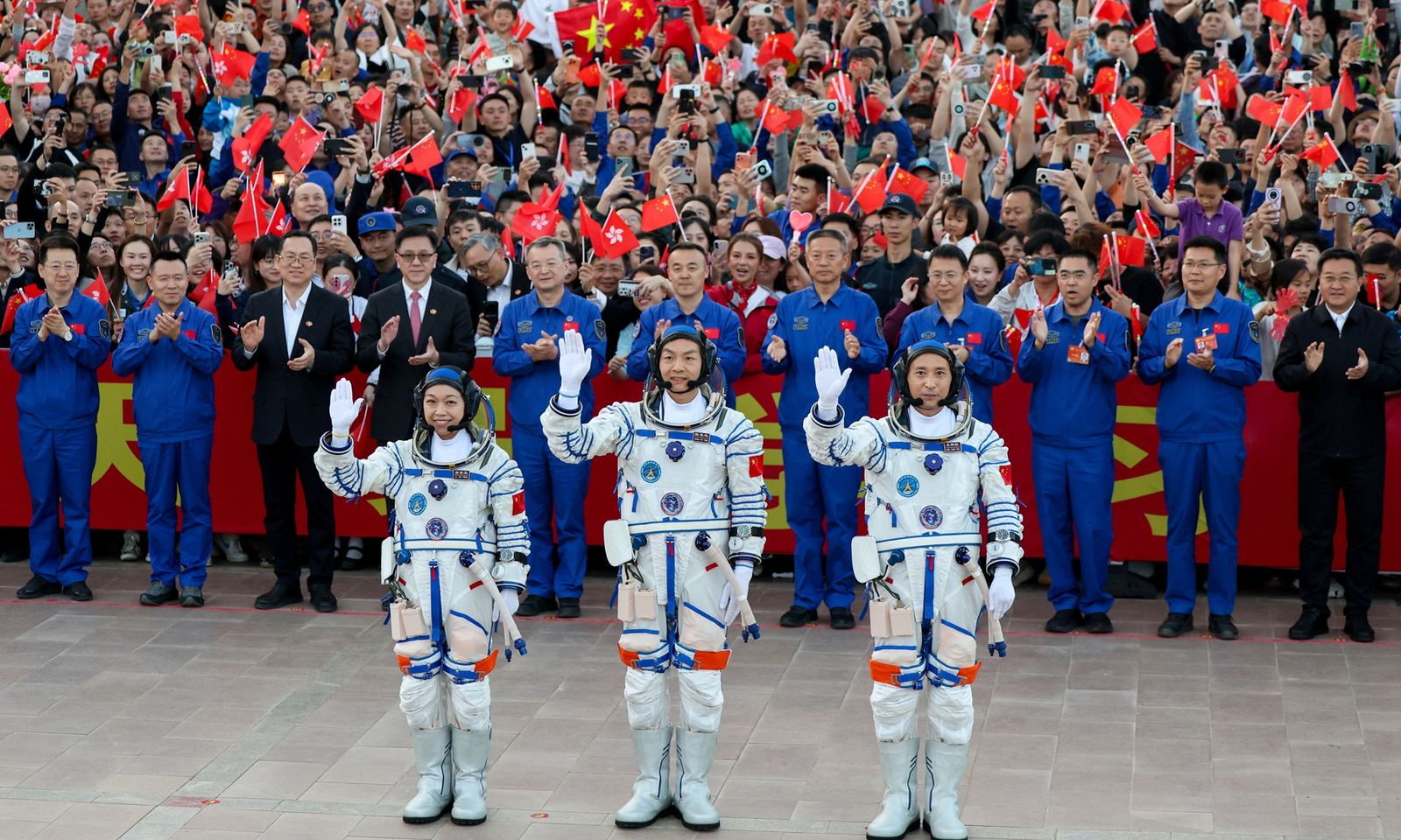 Chinese astronauts Zhu Yangzhu (center), Zhang Zhiyuan (right) and Lai Ka-ying, for the Shenzhou-23 crewed spaceflight mission, meet the press at the Jiuquan Satellite Launch Center in Northwest China, on May 23, 2026. Photo: VCG