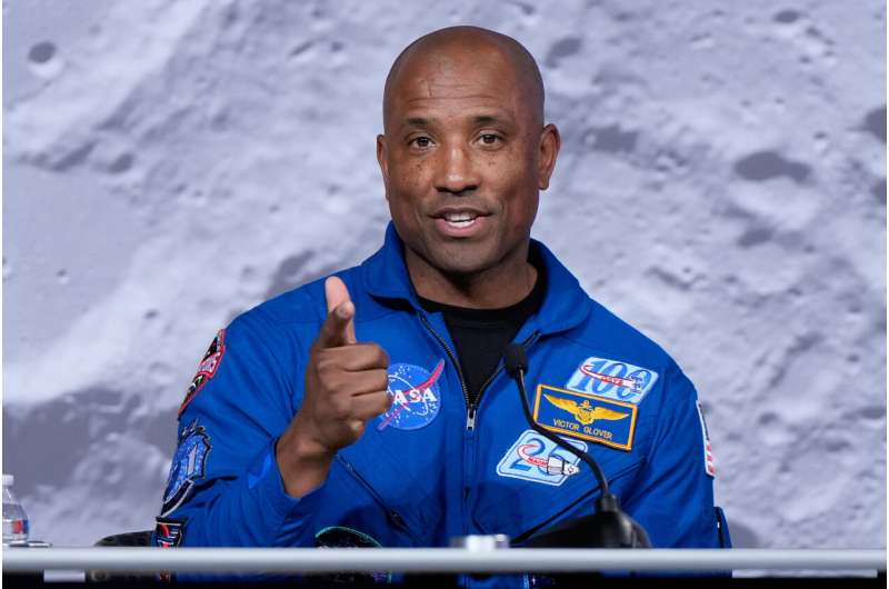 NASA astronaut Victor Glover, a member of the NASA's Artemis II crew, speaks during a news conference on April 16, 2026, in Houston. Credit: AP Photo/Ashley Landis, file Artemis II moonshot commander and pilot are hanging up their astronaut suits at NASA