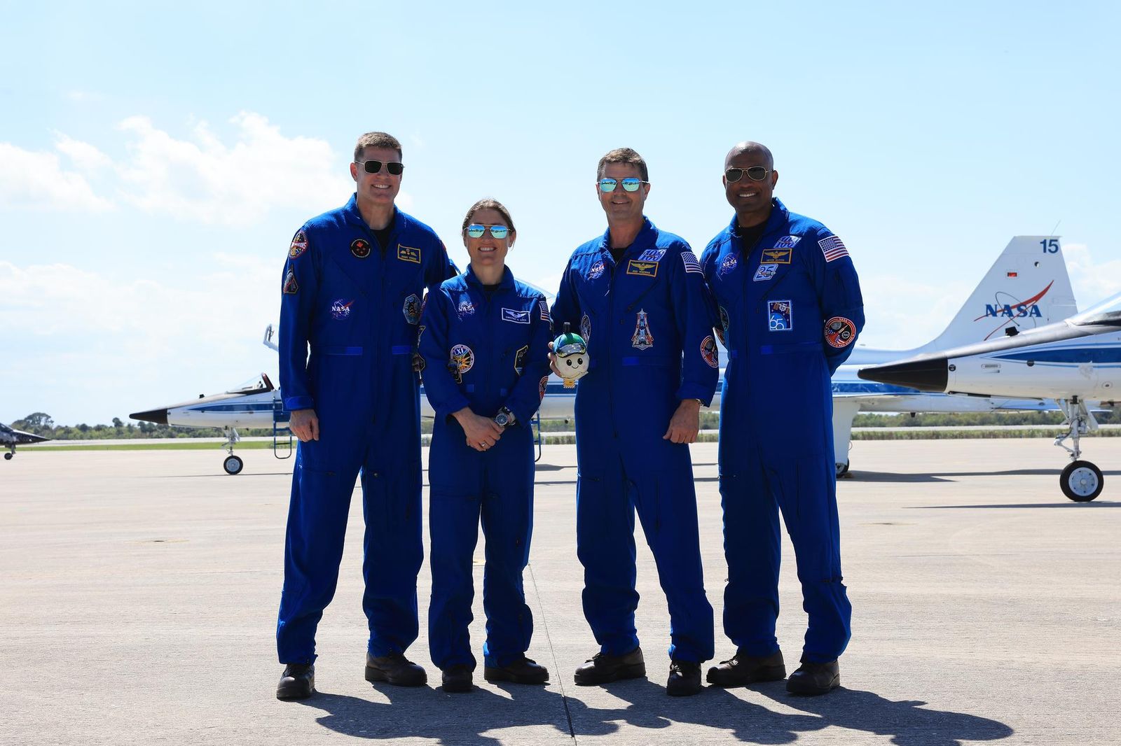 Image shows NASA's Artemis II astronauts dressed in their blue flight suit at the Launch and Landing Facility at NASA's Kennedy Space Center in Florida on Friday, March 27, 2026. Photo credit: NASA/Kim Shiflett