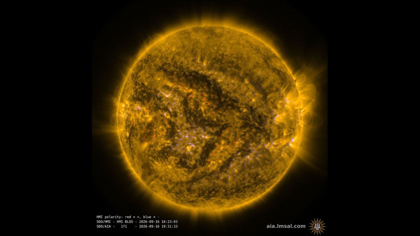 A view of a yellow sphere with some flares coming off of it.