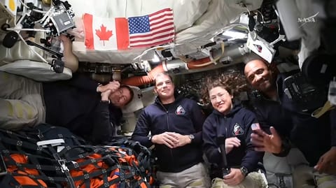 The Artemis II crew - NASA Astronaut Reid Wiseman Wiseman (far left), CSA (Canadian Space Agency) Astronaut Jeremy Hansen (center left) and NASA astronauts Christina Koch (center right) and Victor Glover (right) participated in a live media event in the Orion spacecraft during Flight Day 4.