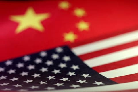 U.S. and Chinese flags are seen in this illustration created on April 10, 2025. REUTERS/Dado Ruvic/Illustration/File Photo