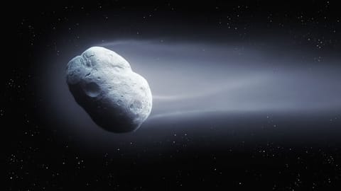 An illustration of a grayish white object with a trail of haze coming off it.