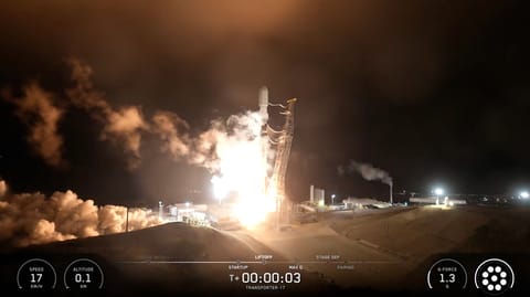 a rocket launches at night