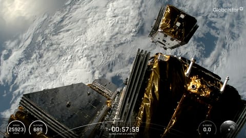 view from a rocket in orbit around earth showing a boxy satellite deploying
