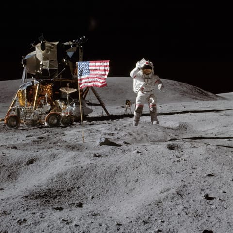 Apollo 16 LM and John Young on the lunar surface