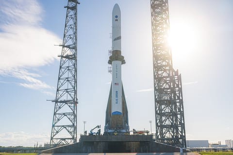 Blue Origin rocket carrying NASA's ESCAPADE is vertical on launch pad.