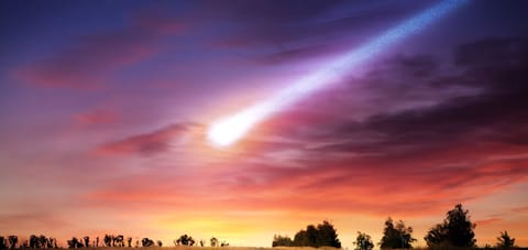 An illustration of a meteor streaking across the sky.