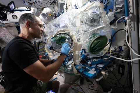 NASA astronaut and Expedition 75 flight engineer Anil Menon uses a lead-free soldering technique to solder components on a circuit board and demonstrate the manufacturing and repair of electronics in microgravity. Menon conducted safe research operations inside a container system attached to the Harmony module's maintenance work area to protect the International Space Station's atmosphere. The MIYOKA experiment will return the space-soldered samples to Earth for analysis and compared them to ide