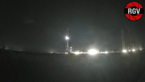 Starbase launch site with Ship 41 and Booster 21 visible, photographed by RGV Aerial Photography