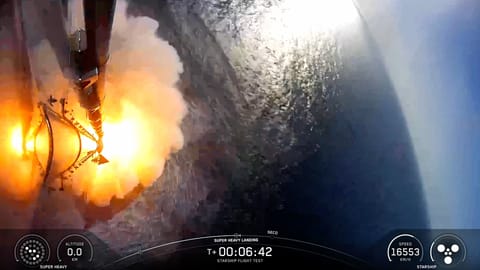 A SpaceX Super Heavy booster splashes down in the Gulf of Mexico.