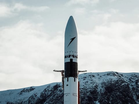 Rocket against mountain backdrop