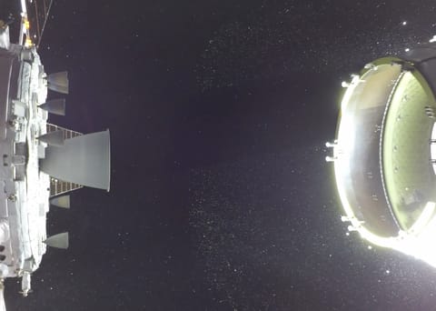 Two of the Artemis II CubeSats can be seen in the lower portion of the Orion stage adapter on the right side of the image.