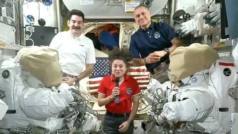 NASA astronauts (clockwise from left) Jack Hathaway, Anil Menon and Jessica Meir speak with U.S. President Donald Trump, who visited NASA’s Johnson Space Center on Aug. 28, 2026.