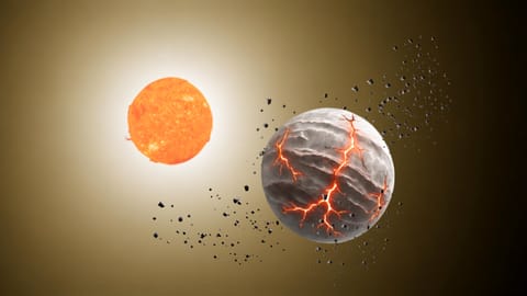 A cracked grey sphere next to a growing orange sphere