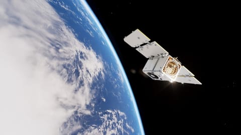illustration of a white, boxy satellite high above earth