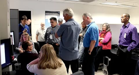 Traffic Flow Management System (TFMS) Deployment Team and representatives from MITRE Corp and MIT Lincoln Labs participate in IDM demonstration in the AOL