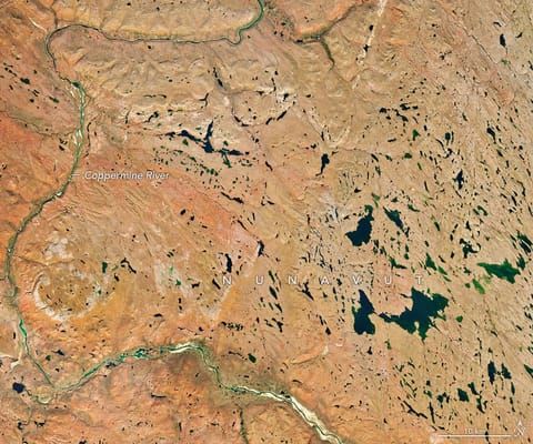 A river winds through the same tundra landscape in autumn, now colored red and orange. Some green vegetation remains visible along the river.