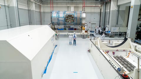 Technicians at Thales Alenia Space in Turin, Italy prepare the HALO habitat module for transport to the United States.