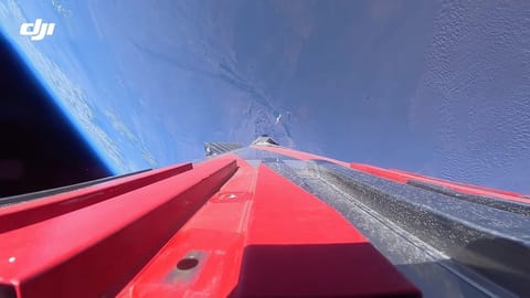Insta360's Bold Rocket Launch Filmed with Advanced Cameras Takes Aim at DJI's Market Position Close-up of a detailed camera lens mounted on a sleek, metallic surface indoors.