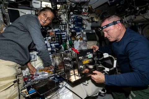 Butch Wilmore and Suni Williams inside the International Space Station.