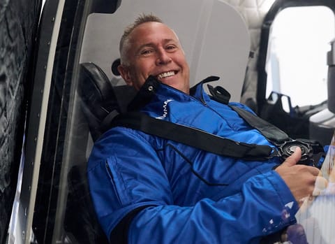 Aaron Newman in flight suit