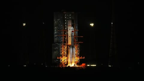A Long March 7 rocket launches the Tianzhou 9 cargo mission to China's Tiangong space station on July 14, 2025.