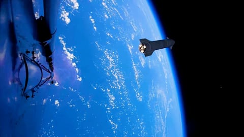 a dark, conical spaceship is seen high above Earth from another spacecraft in space