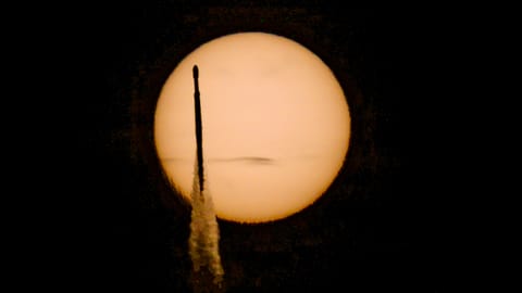 A rocket transits the sun