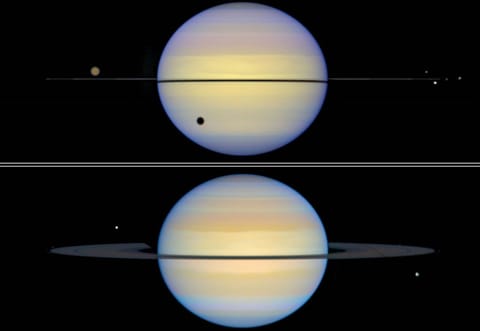 Two images of Saturn, side-by-side. In the top image, where Saturn's rings are edge-on, they appear as a black line across the planet. Saturn's large moon Titan appears as an orange sphere above the rings on the left side, casting a shadow onto Saturn's lower-left, and four more smaller moons are visible at the right edge of Saturn's rings. In the bottom image, the rings aren't quite edge-on and more easily visible. One moon is above the rings on the left side, a second (much smaller) moon is at