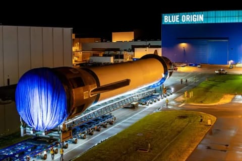 Blue Origin's twice-flown New Glenn first-stage booster named "Never Tell Me The Odds" is transported from the company's Rocket Park campus in Merritt Island to an integration facility in mid September. (Courtesy/Blue Origin)