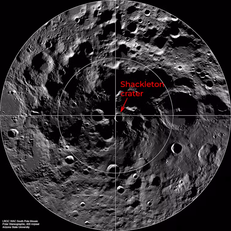 A circle view of a grey pockmarked surface showing the Shackleton crater next to the centre.