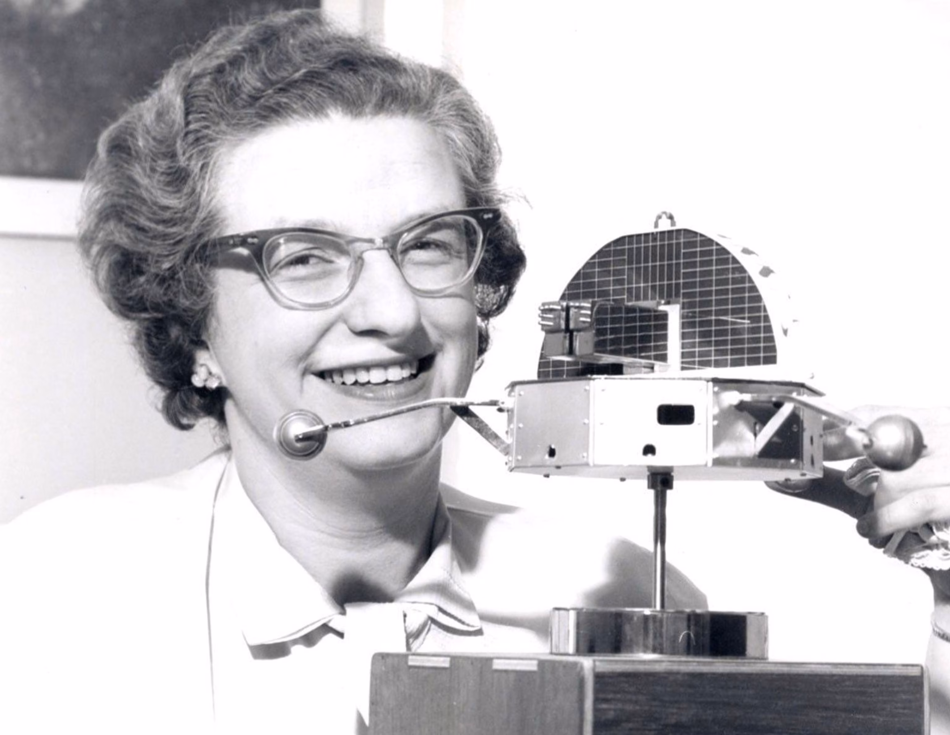 PHOTO: Dr. Nancy Grace Roman is shown with a model of the Orbiting Solar Observatory (OSO) in 1962. She was the first Chief of Astronomy in the Office of Space Science at NASA Headquarters and the first woman to hold an executive position at NASA.
